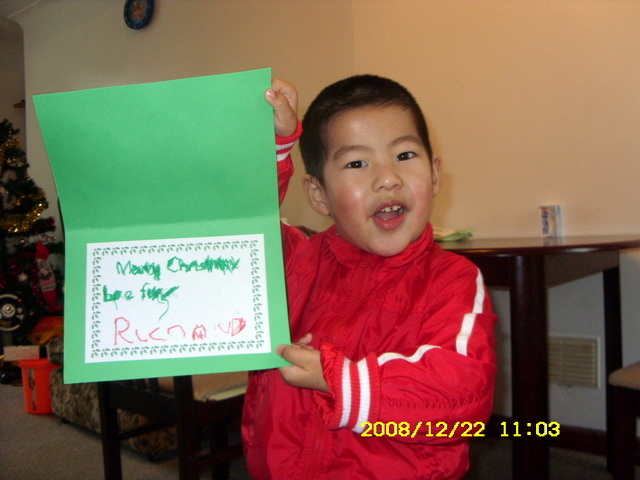儿子在幼儿园自己做的圣诞节贺卡跟2009年的