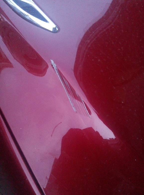 十月七号,车子被刮擦了,怎么办?-讲白搭-台州1