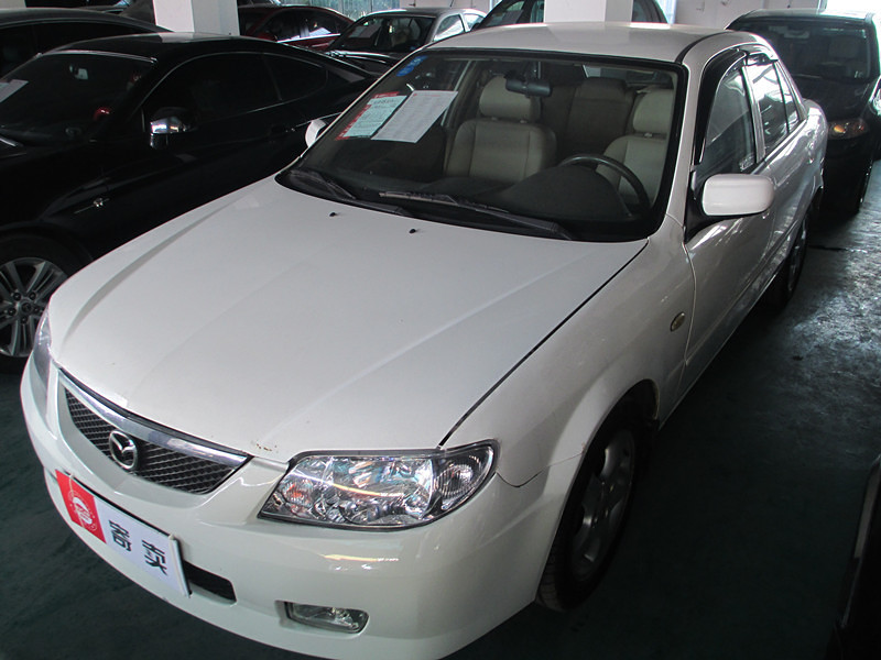 杭州 马自达323福美来 2003年12月 1.6 手动档 白色