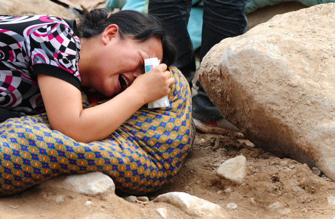 甘肃舟曲泥石流灾难中感天动地的九个亲情故事